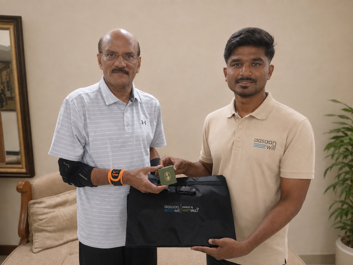 An AasaanWill representative handing a completed Will document kit to a customer at home